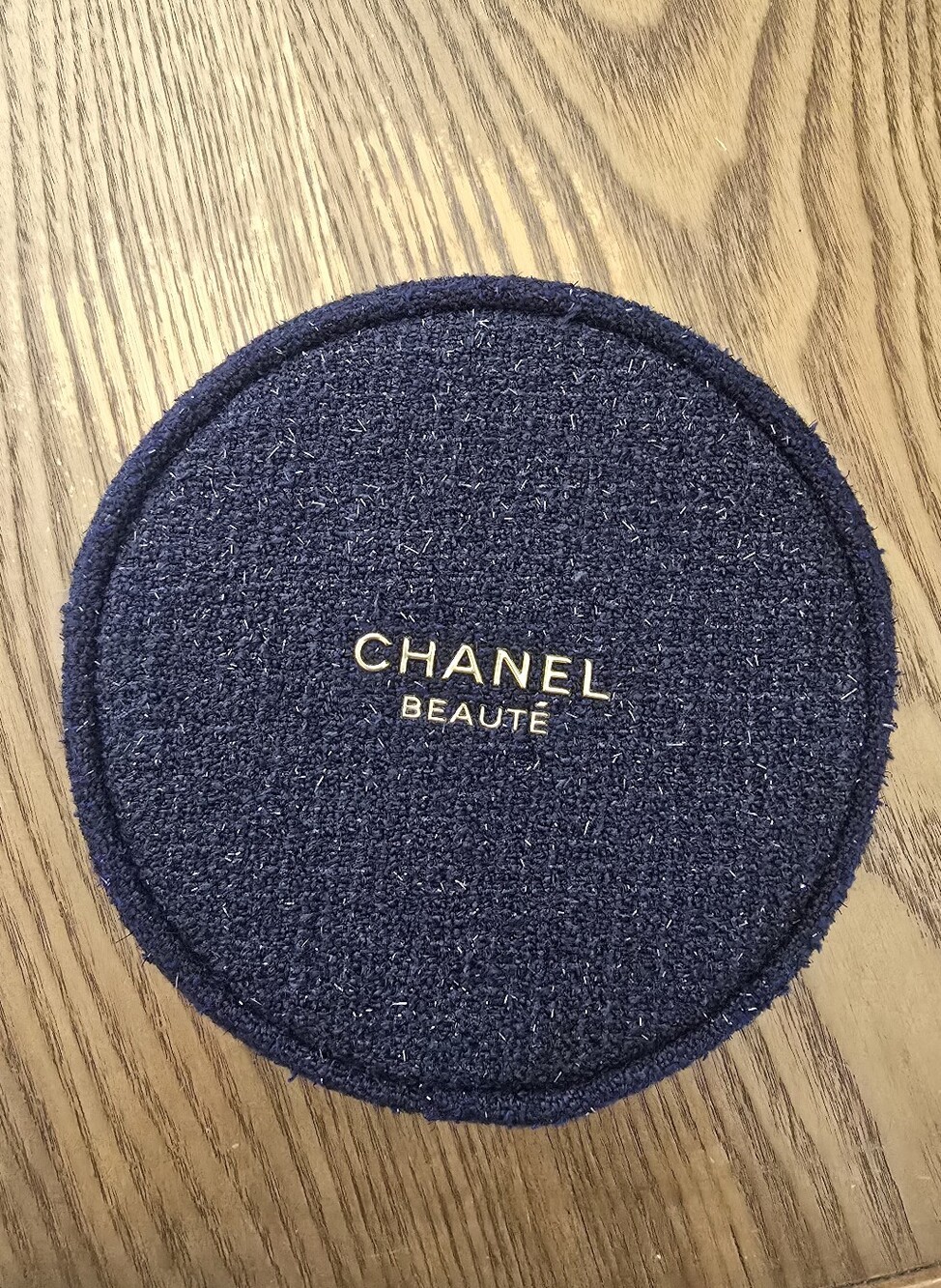 New CHANEL Navy Round Cosmetic Case with Gold Logo